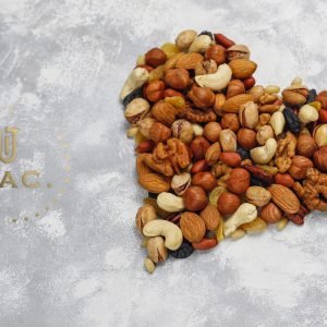Assortment of nuts shape of heart Cashew, hazelnuts, walnuts, pi